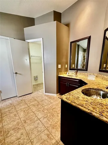 a view of an empty room with entryway