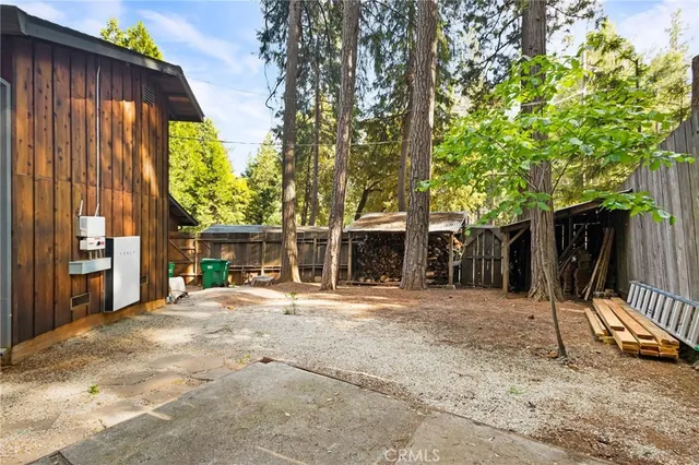 a view of a garden with sitting area