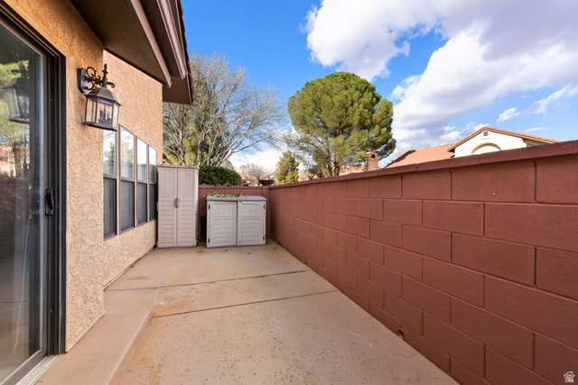 301 South 1200th Street East, Unit 31 St. George, UT 84790 - Photo 18 of 21 Fenced backyard with a patio