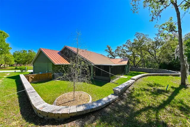 a view of a swimming pool with a garden