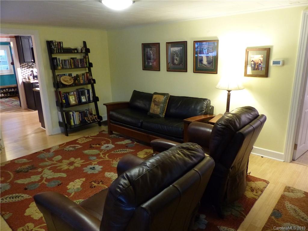 475 Brooks Lake Road Rutherfordton, NC 28139 - Photo 17 of 28 a living room with furniture and wooden floor