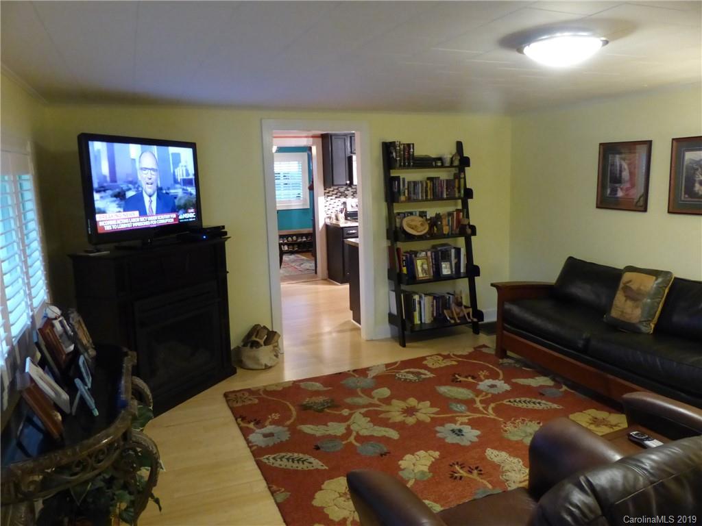 475 Brooks Lake Road Rutherfordton, NC 28139 - Photo 18 of 28 a living room with furniture and a flat screen tv