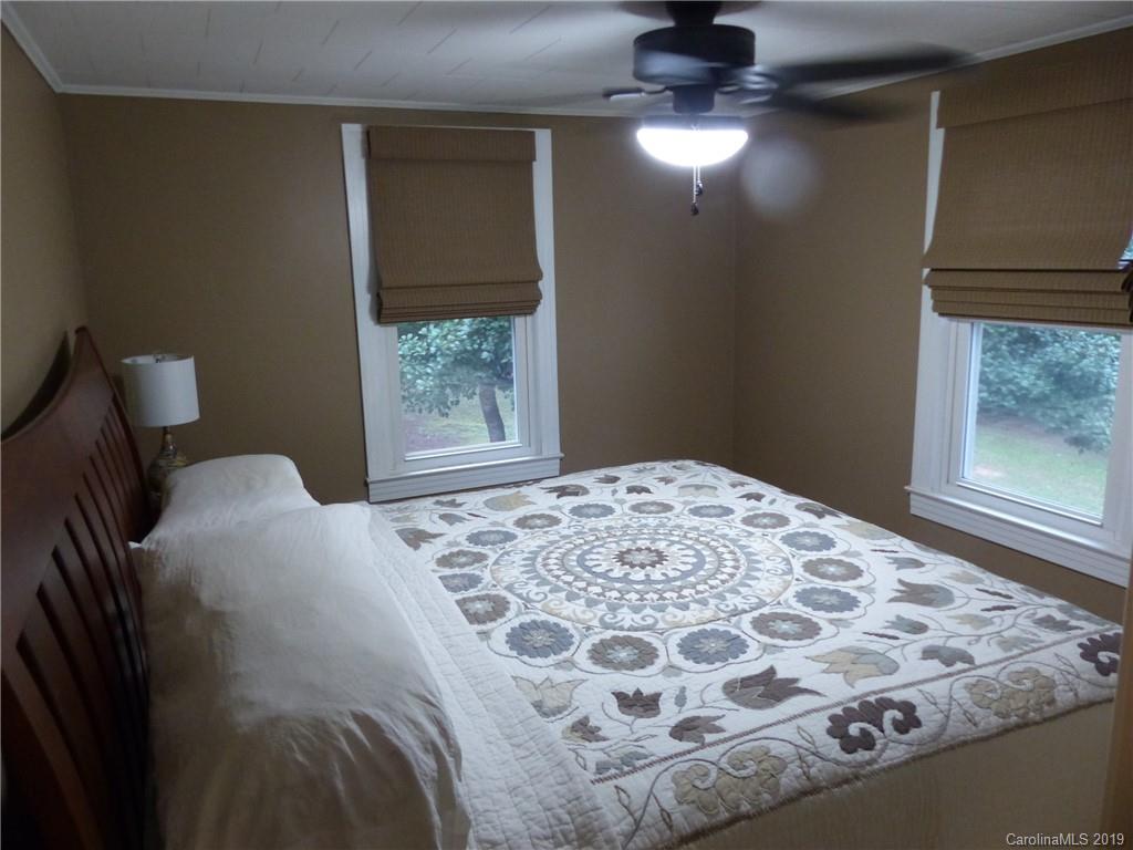 475 Brooks Lake Road Rutherfordton, NC 28139 - Photo 19 of 28 a bedroom with a bed and a window