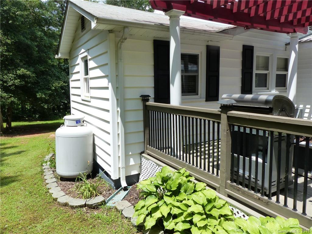 475 Brooks Lake Road Rutherfordton, NC 28139 - Photo 3 of 28 a view of a chair and table in the patio