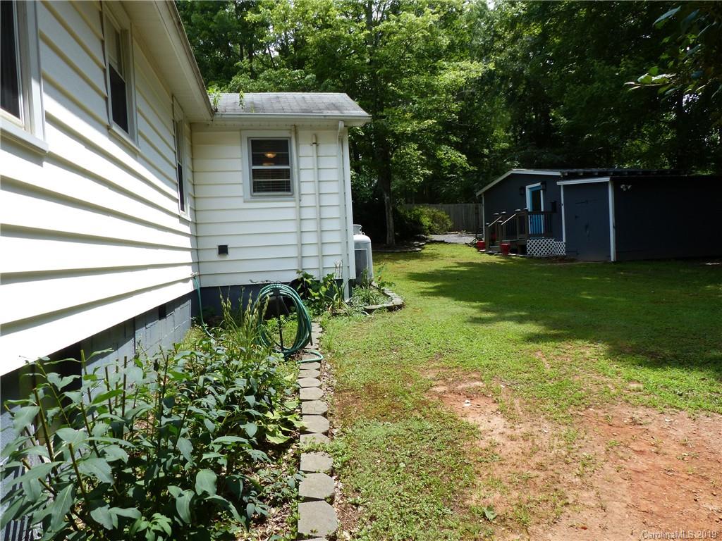 475 Brooks Lake Road Rutherfordton, NC 28139 - Photo 4 of 28 a view of a house with a backyard