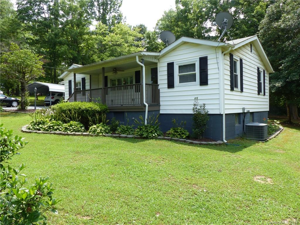 475 Brooks Lake Road Rutherfordton, NC 28139 - Photo 7 of 28 a view of a house with backyard and garden