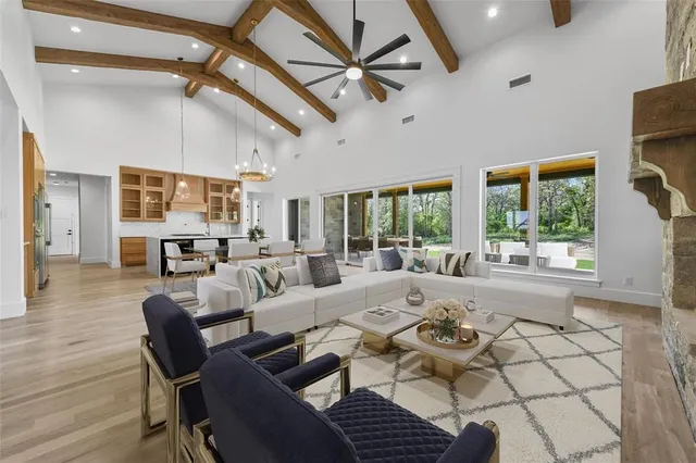a kitchen with stainless steel appliances a sink and a refrigerator