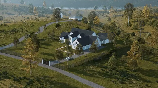 an aerial view of a house with a yard