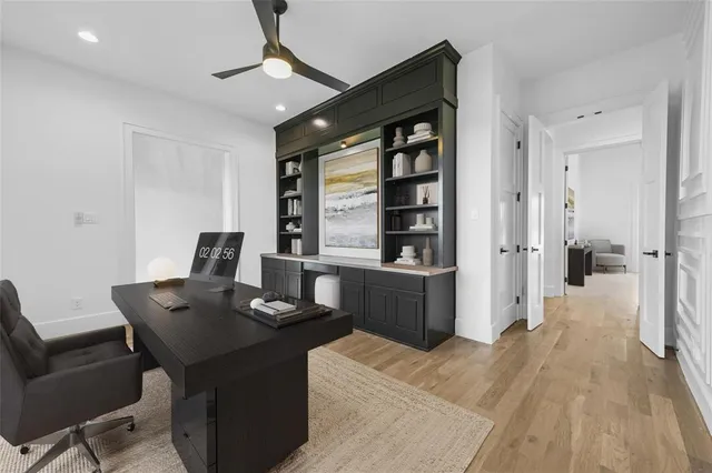 a bedroom with a bed couch and a window