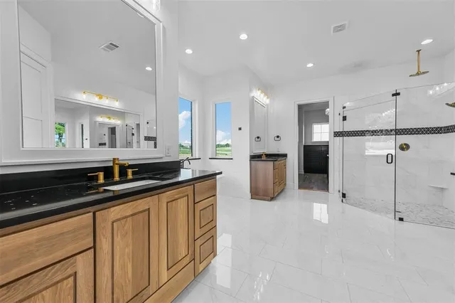 a kitchen with a refrigerator and a cabinets