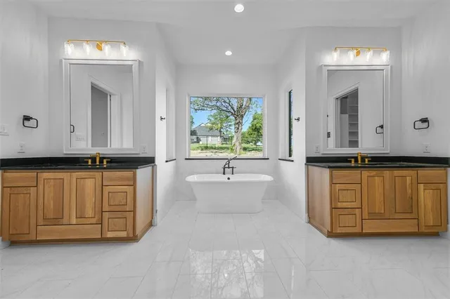 a bed room with bed and a window