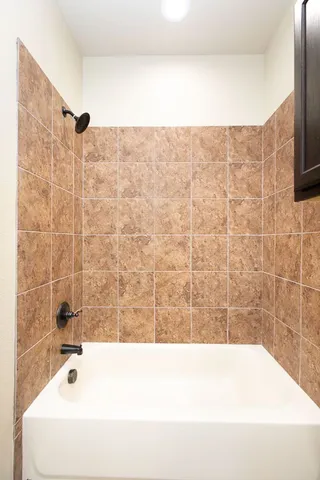 a bathroom with a bathtub