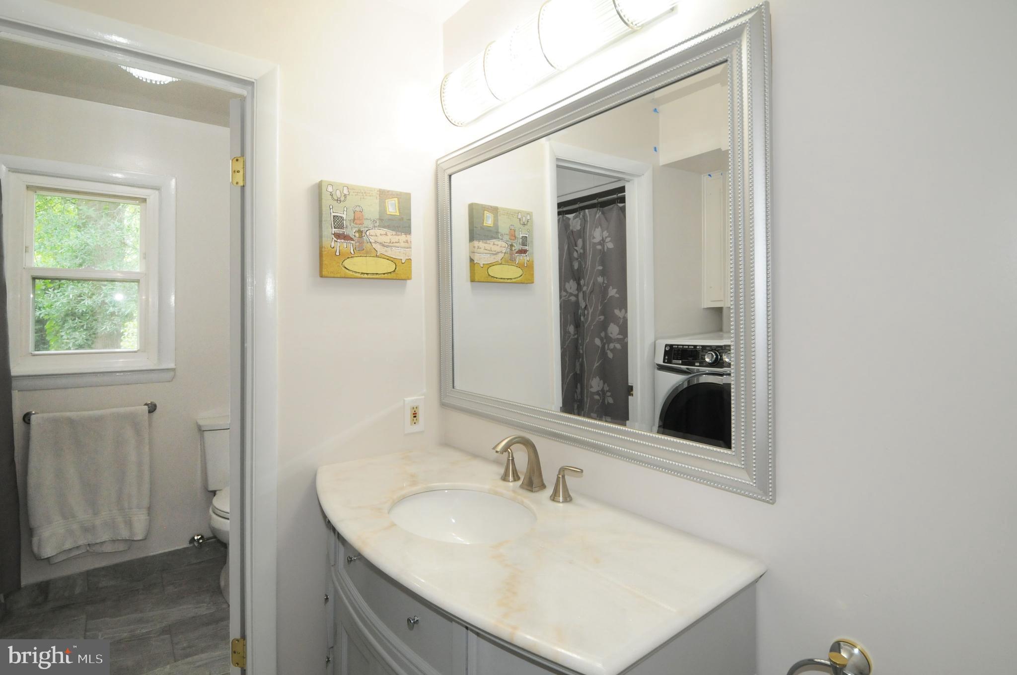 7821 Elba Road Alexandria, VA 22306 - Photo 29 of 54 MASTER BATH HAS SEPARATE COMMODE & TUB AREA