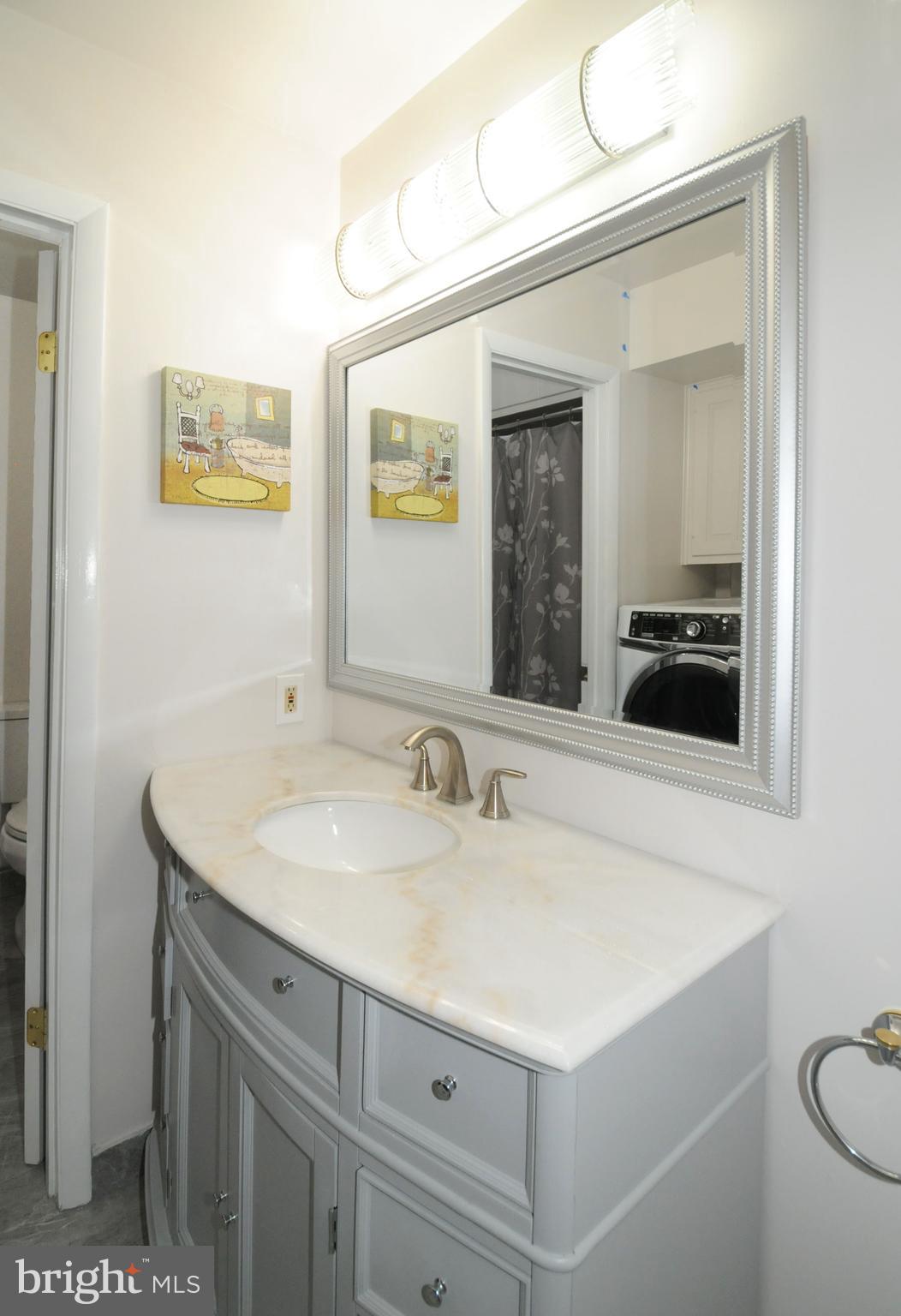 7821 Elba Road Alexandria, VA 22306 - Photo 30 of 54 ATTRACTIVE VANITY & INTERESTING LIGHTING