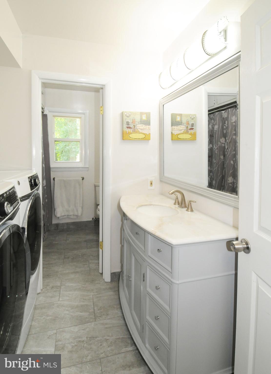 7821 Elba Road Alexandria, VA 22306 - Photo 31 of 54 MASTER BATH & HANDY WASHER & DRYER