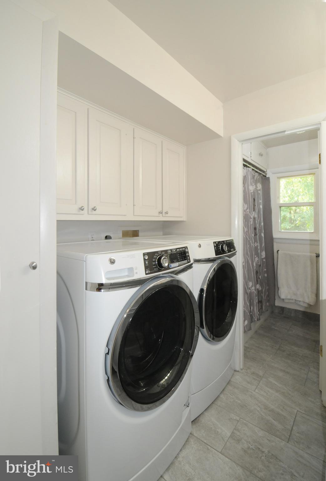 7821 Elba Road Alexandria, VA 22306 - Photo 32 of 54 STORAGE ABOVE THE WASHER & DRYER & ABOVE THE TUB