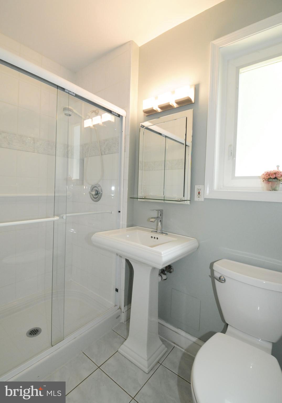 7821 Elba Road Alexandria, VA 22306 - Photo 44 of 54 3RD FULL BATH ON THE REC ROOM LEVEL