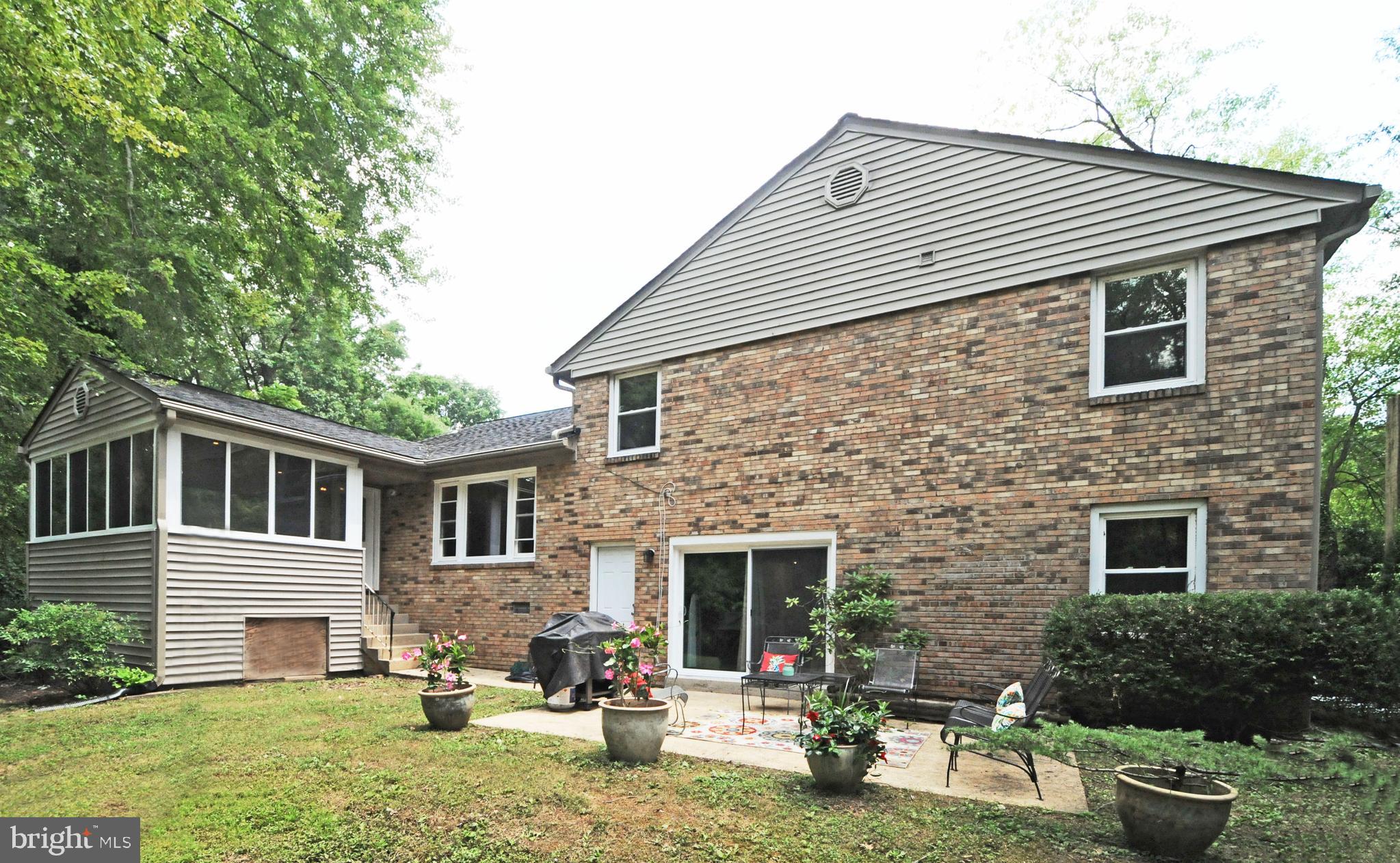 7821 Elba Road Alexandria, VA 22306 - Photo 47 of 54 PATIO ACCESS FROM SUNROOM ADDITION OR REC ROOM