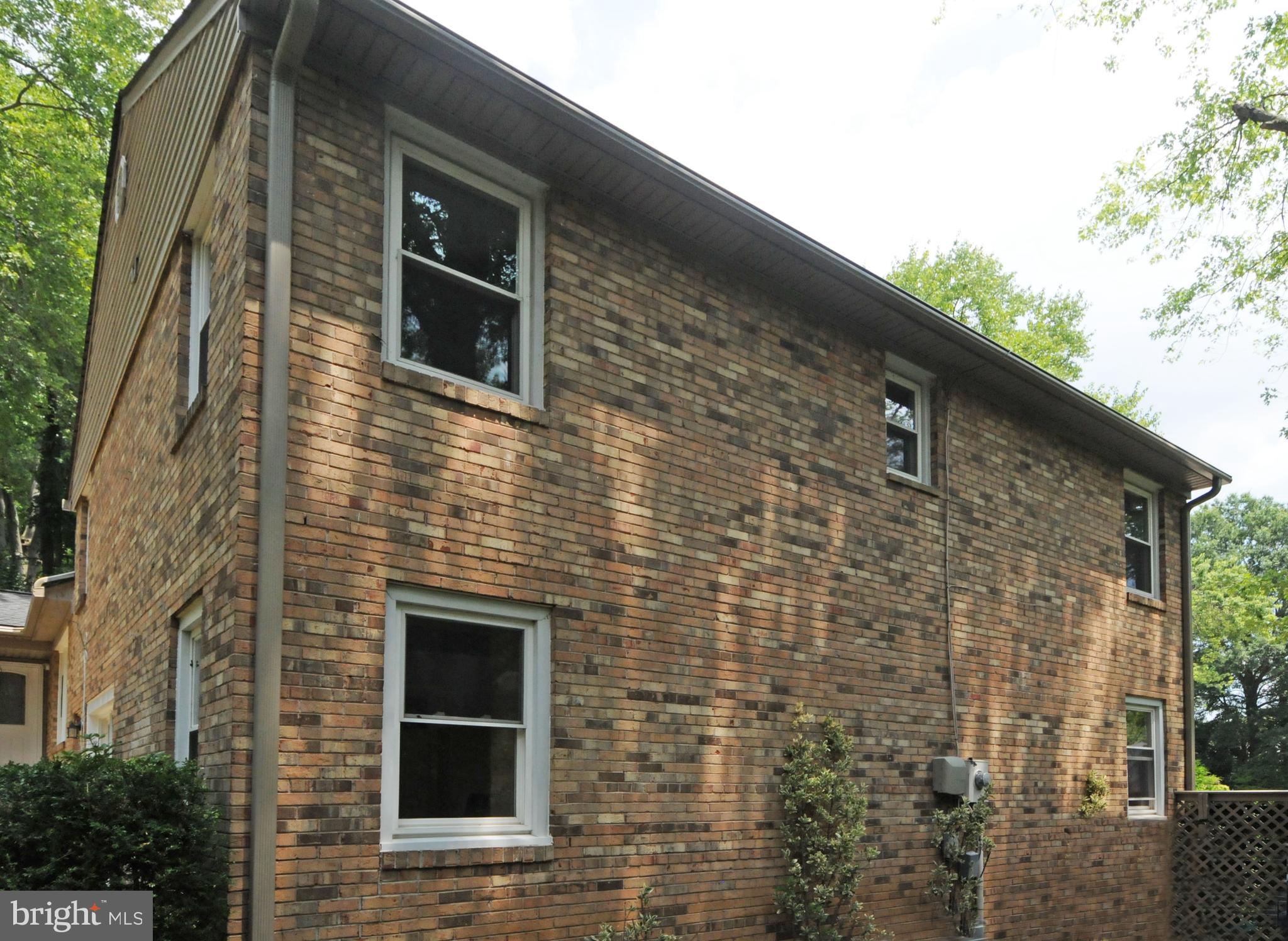7821 Elba Road Alexandria, VA 22306 - Photo 51 of 54 LEFT END OF THIS MOSTLY BRICK HOME