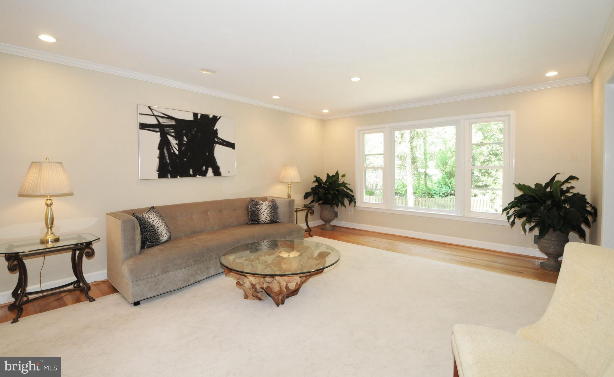 7821 Elba Road Alexandria, VA 22306 - Photo 7 of 54 LARGE DOUBLE PANE WINDOWS FOR NATURAL LIGHT