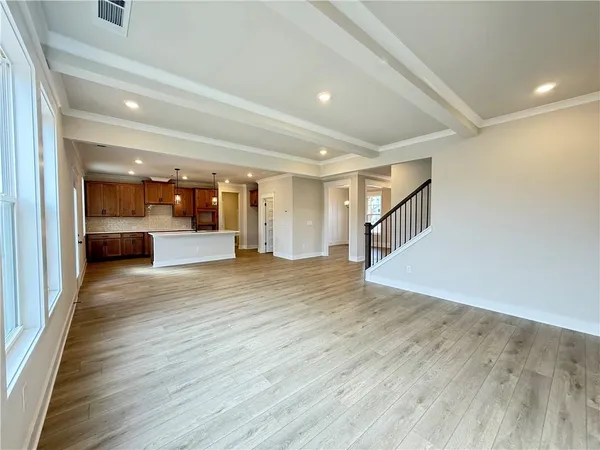 a view of entryway with wooden floor