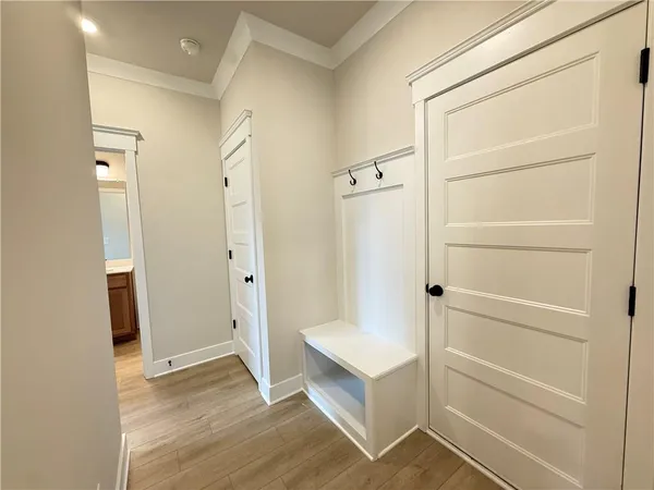 a view of a house with swimming pool and sitting area