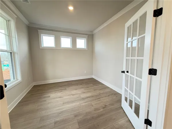 a bathroom with a sink toilet vanity and shower