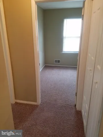 a view of a small space with a window