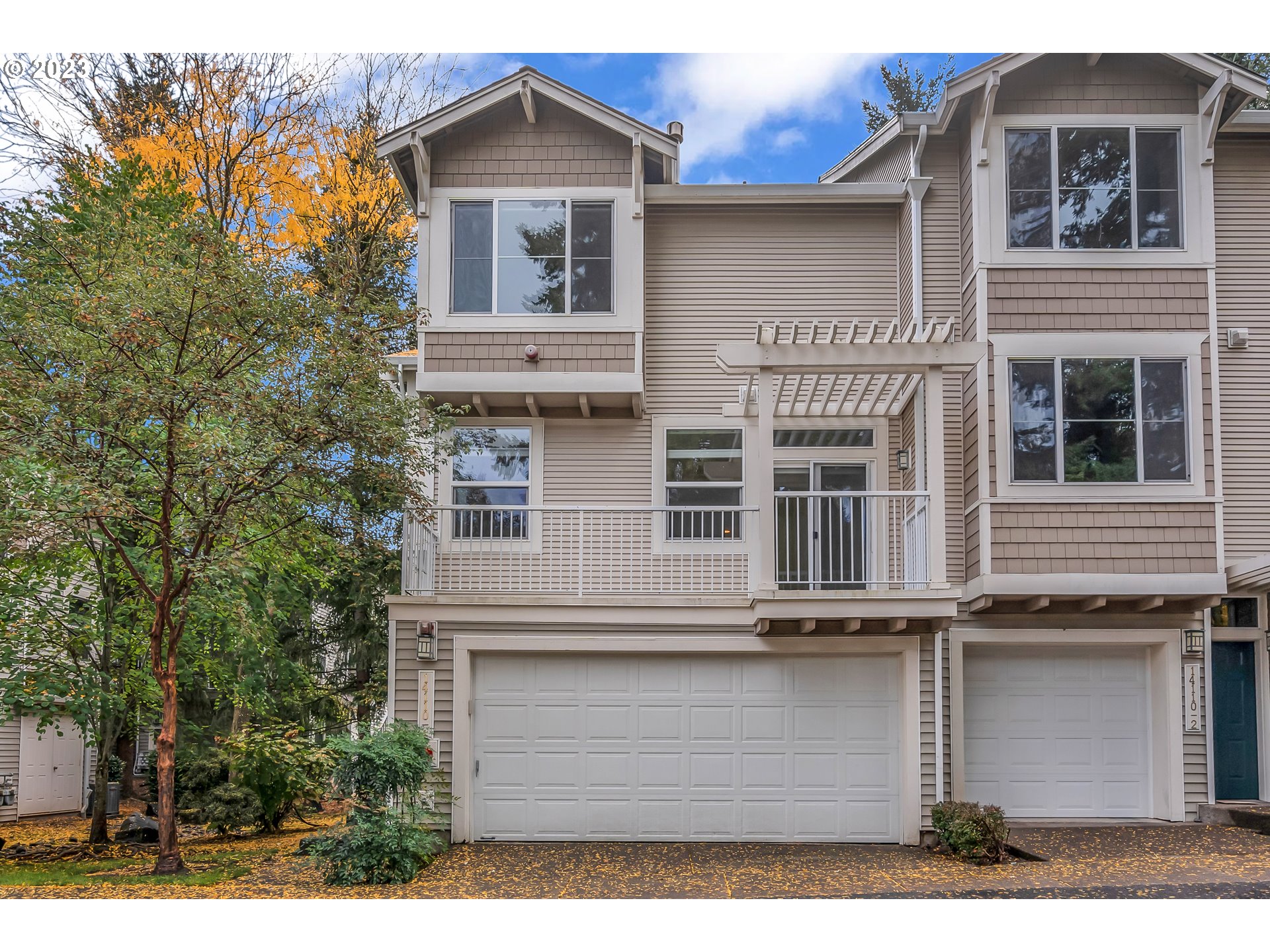 a view of a house with large windows