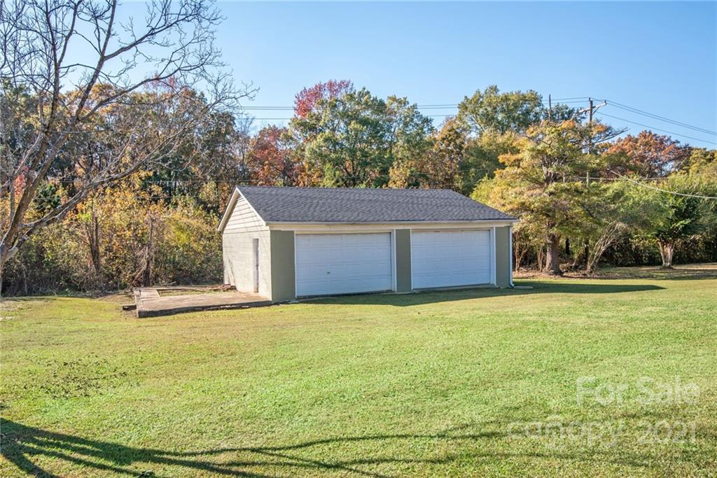 918 Zeb Helms Road Monroe, NC 28112 - Photo 3 of 28 a house with yard in front of it