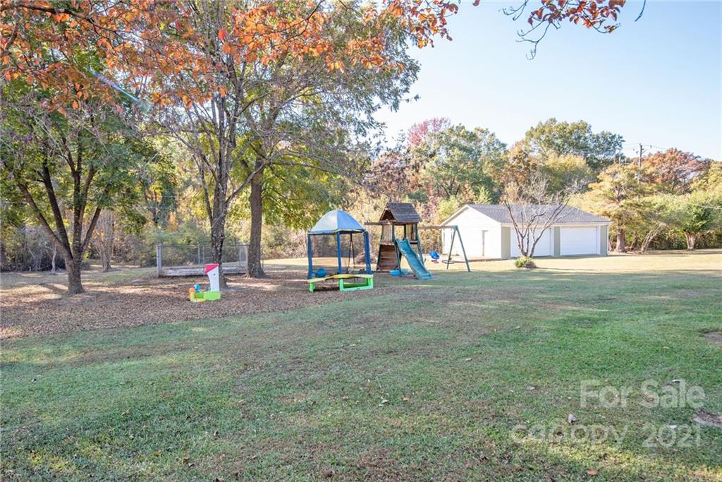 918 Zeb Helms Road Monroe, NC 28112 - Photo 22 of 28 a view of yard with tree s