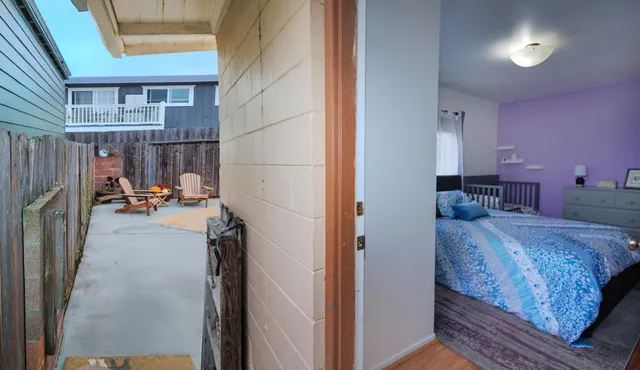 a view of living room with furniture and a window
