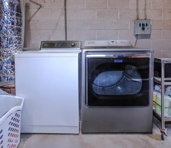 a stove top oven sitting inside of a kitchen