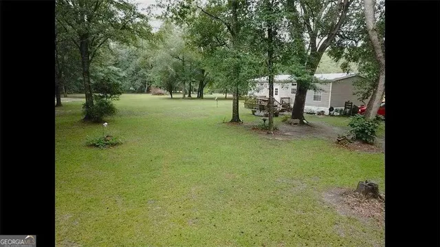 a view of outdoor space and yard