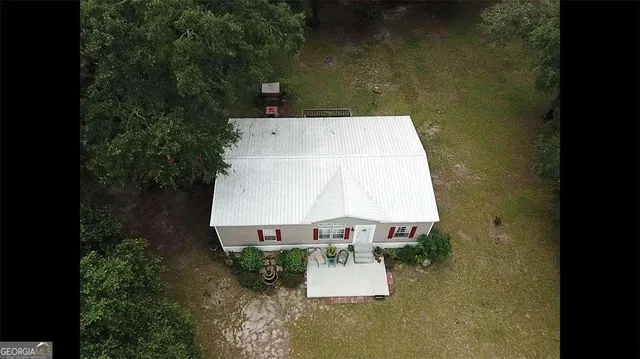 a view of a two chairs in the deck