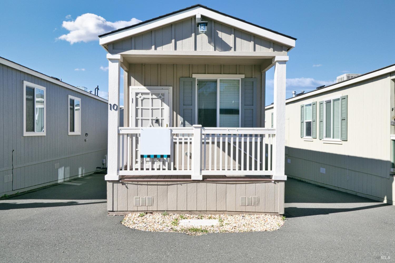 1161 Benicia Road, Unit 10 Vallejo, CA 94591 - Photo 1 of 1 a view of a house with a porch