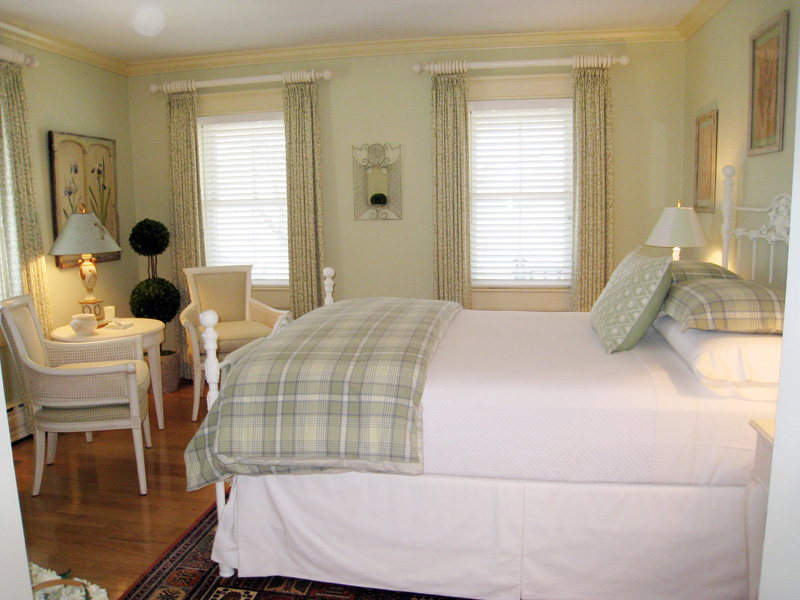26 Old Tom Nevers Road Nantucket, MA 02554 - Photo 16 of 22 a bedroom with a bed and windows