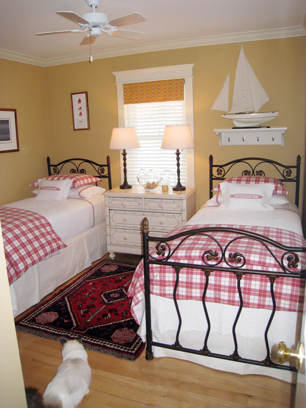 26 Old Tom Nevers Road Nantucket, MA 02554 - Photo 18 of 22 a bedroom with a bed and a window