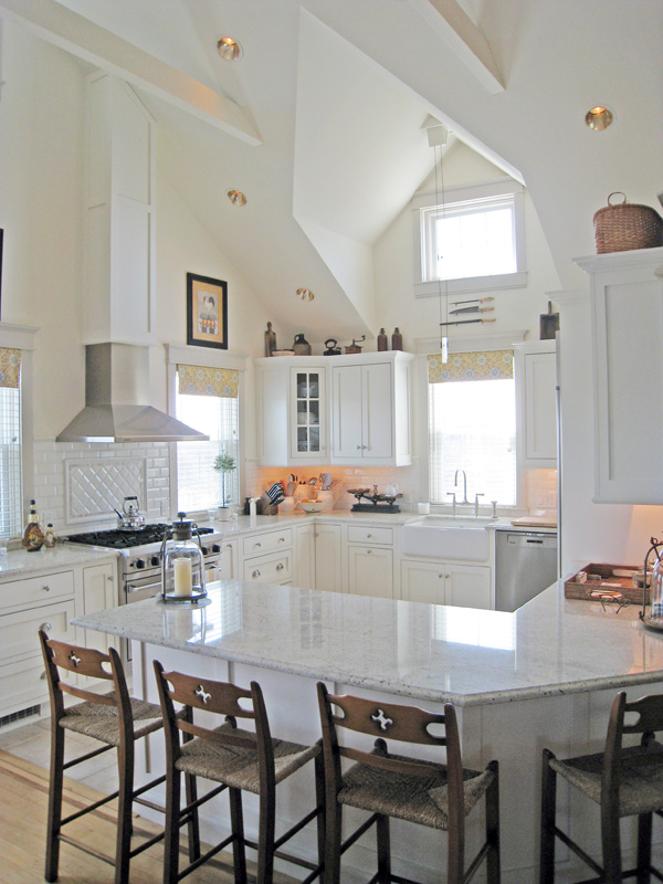 26 Old Tom Nevers Road Nantucket, MA 02554 - Photo 7 of 22 a kitchen with a dining table chairs and window