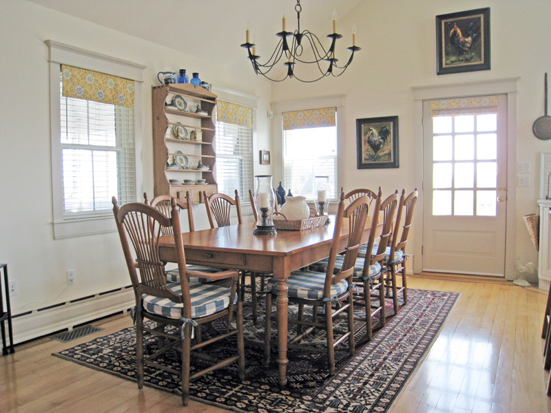 26 Old Tom Nevers Road Nantucket, MA 02554 - Photo 8 of 22 a view of a dining room with furniture window and wooden floor