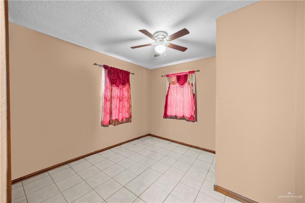 912 Rankin Street Mission, TX 78572 - Photo 14 of 17 a view of an empty room with window