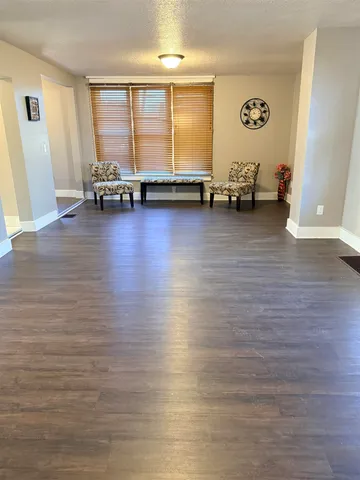 a view of a room with lounge chair window
