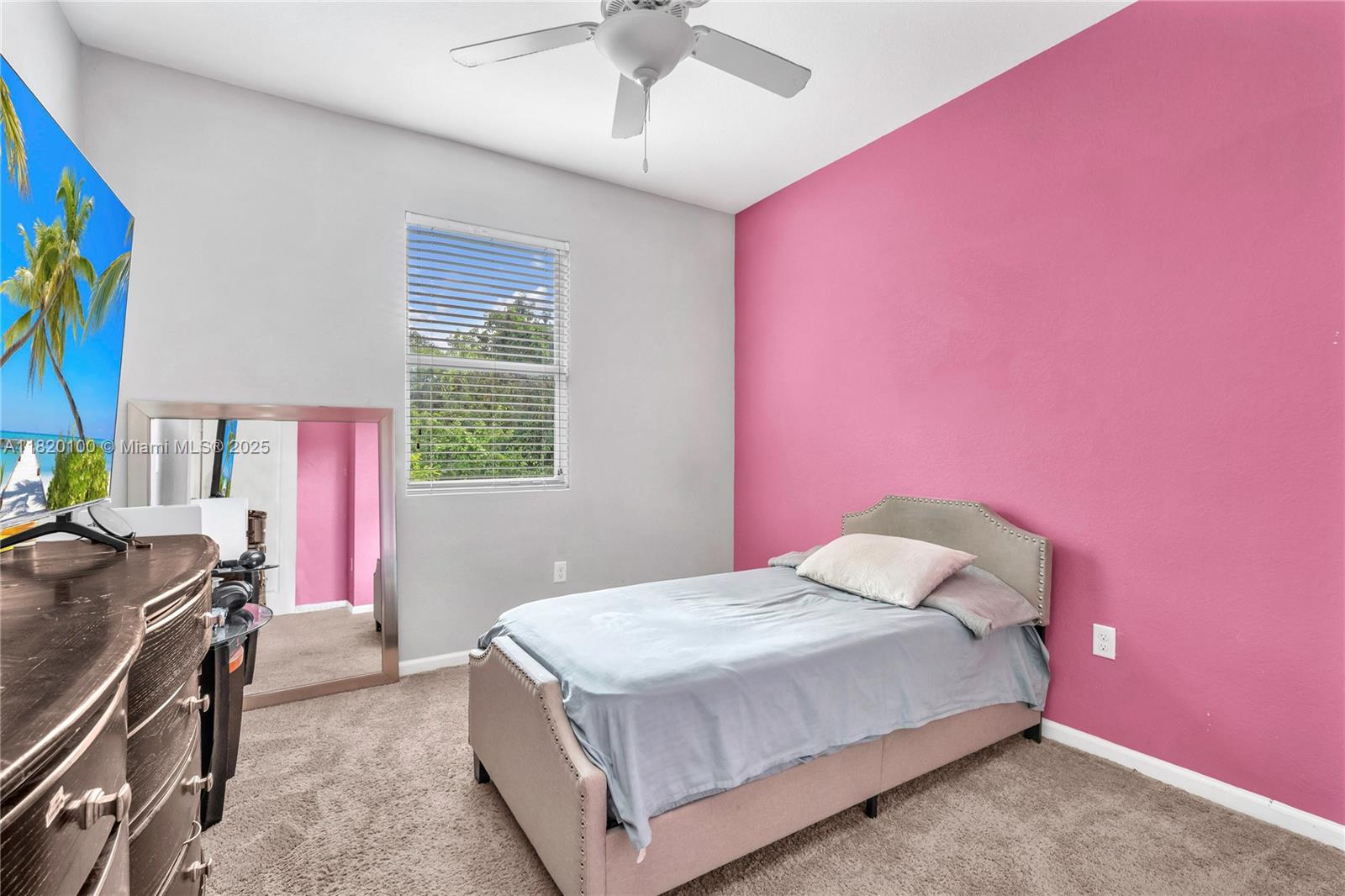 2190 Southeast 2nd Street Homestead, FL 33033 - Photo 21 of 37 a bedroom with a bed and a kitchen