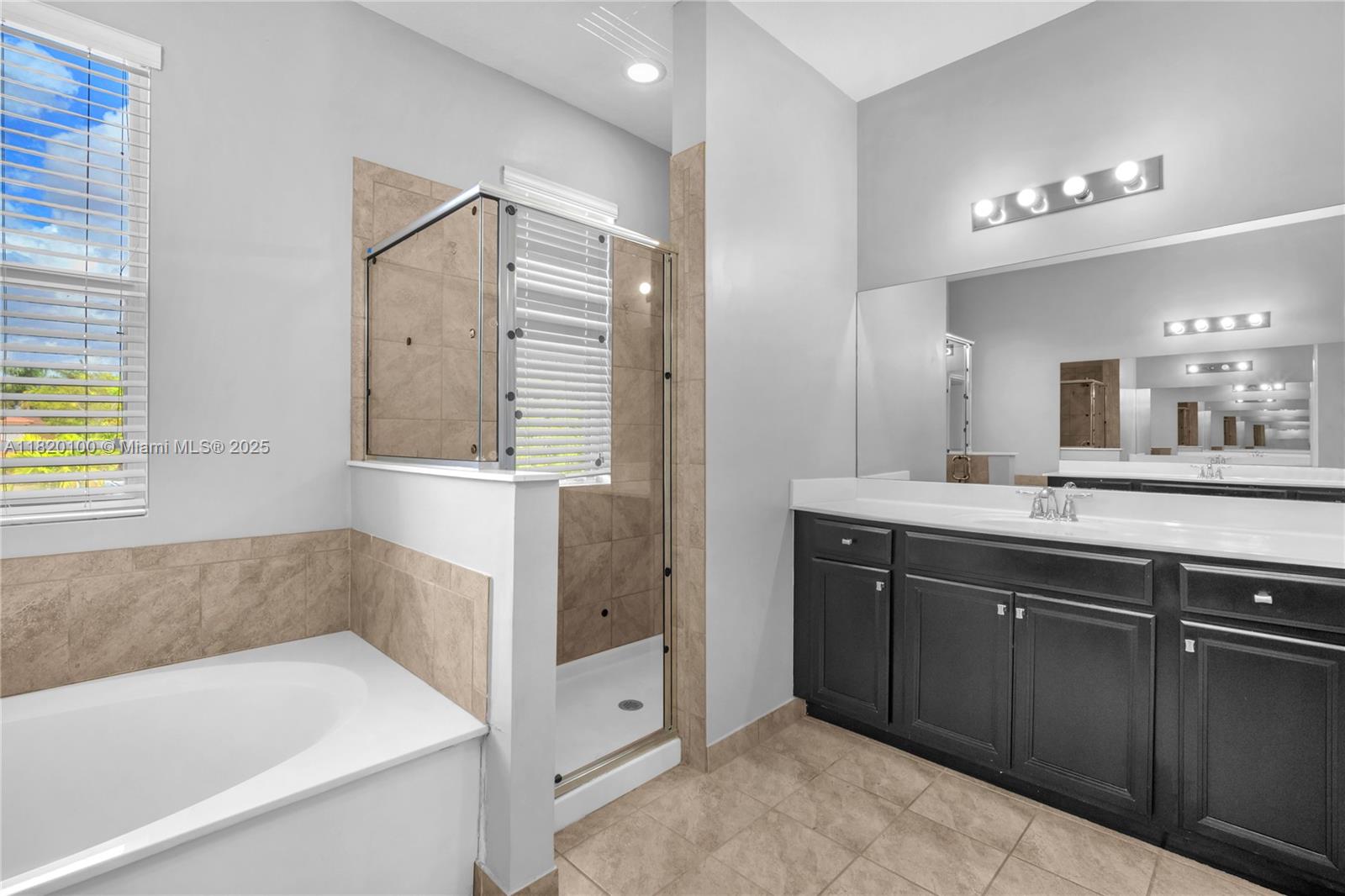 2190 Southeast 2nd Street Homestead, FL 33033 - Photo 30 of 37 a bathroom with a tub sink and mirror