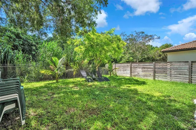 a view of a backyard with a garden