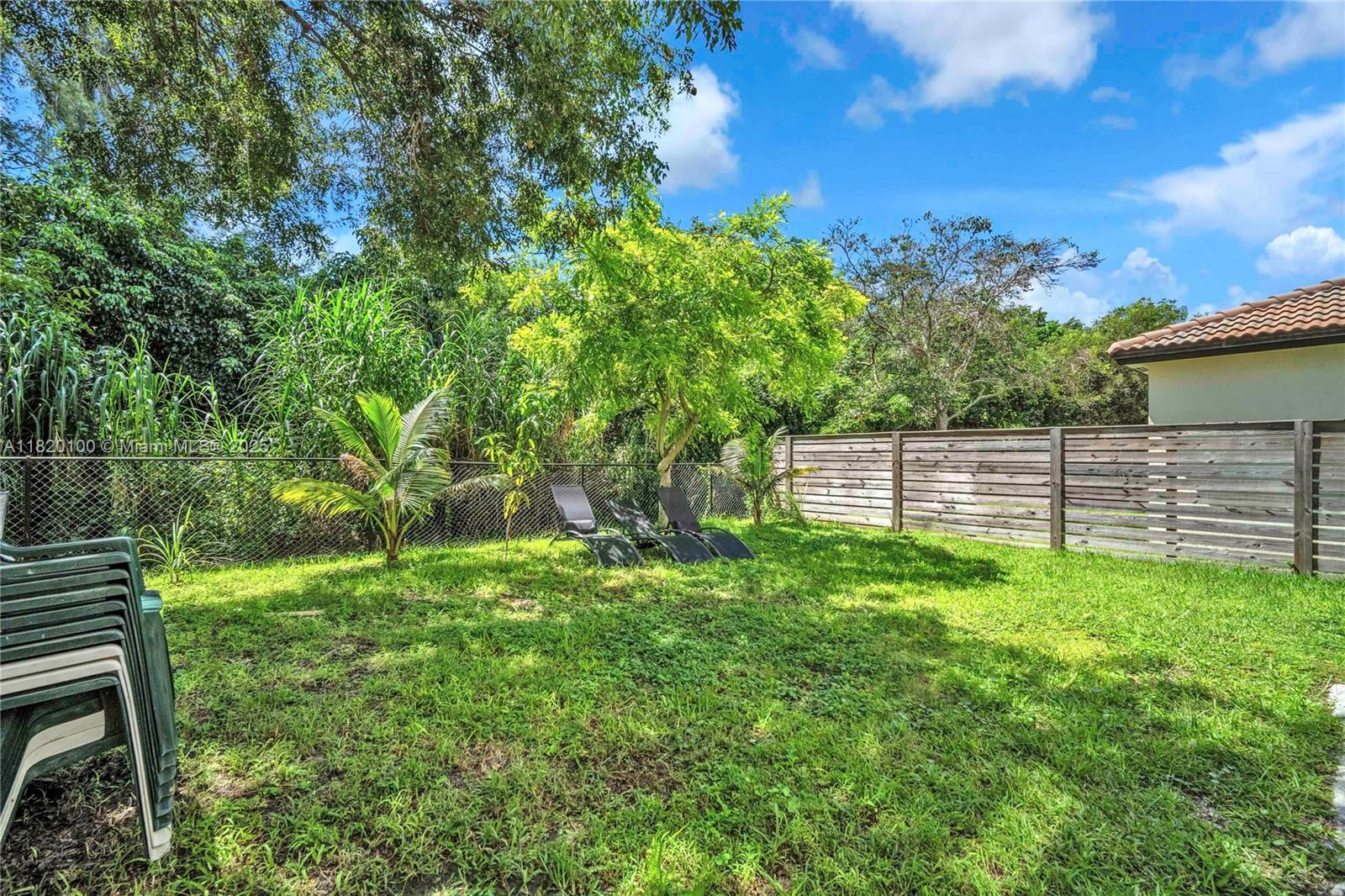 2190 Southeast 2nd Street Homestead, FL 33033 - Photo 33 of 37 a view of a backyard with a garden