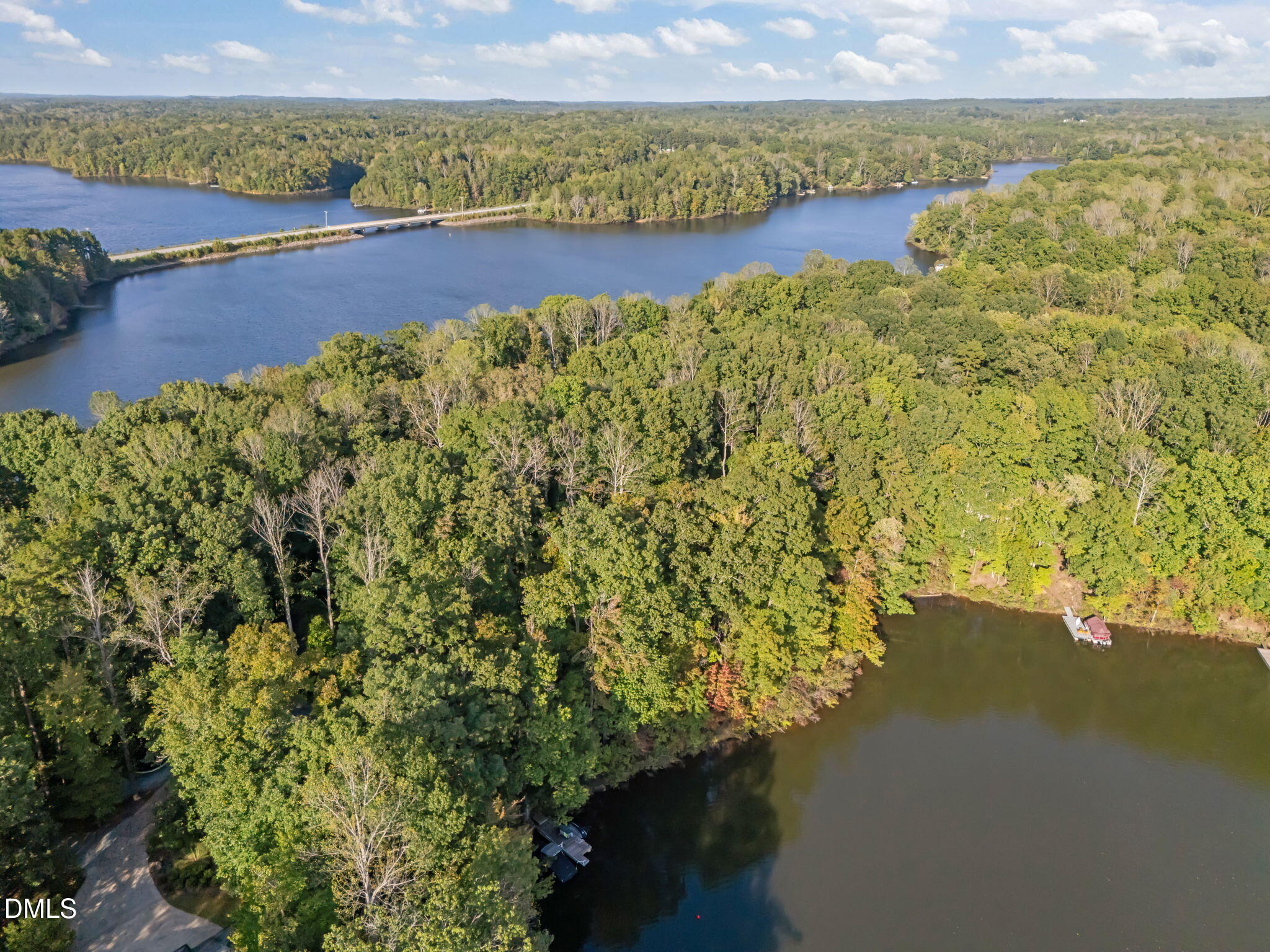 641 Fishermans Point Road Roxboro, NC 27574 - Photo 3 of 12 a view of a lake with a mountain in the background