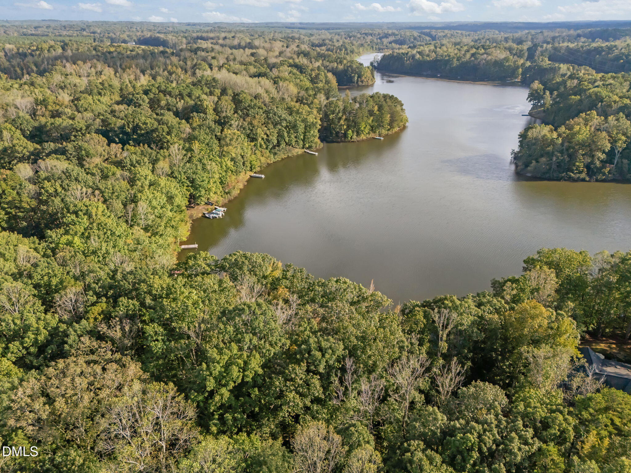 641 Fishermans Point Road Roxboro, NC 27574 - Photo 6 of 12 an aerial view of a house with a lake view
