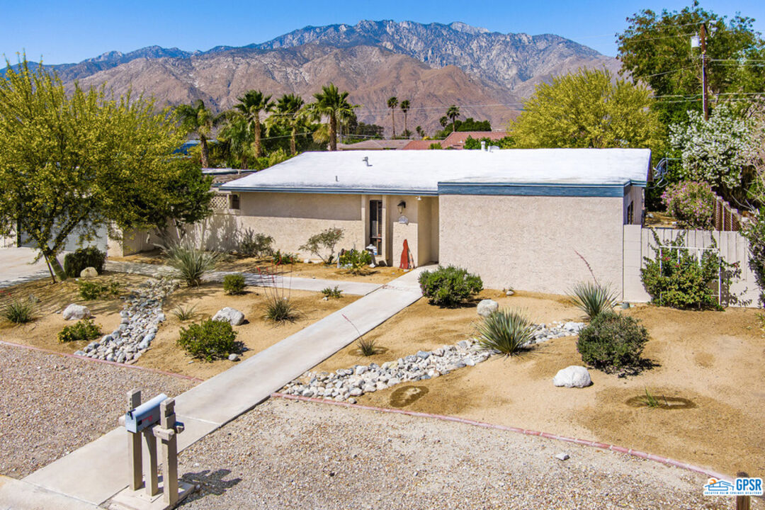 2783 North Cerritos Road Palm Springs, CA 92262 - Photo 1 of 25 a view of a terrace with a garden