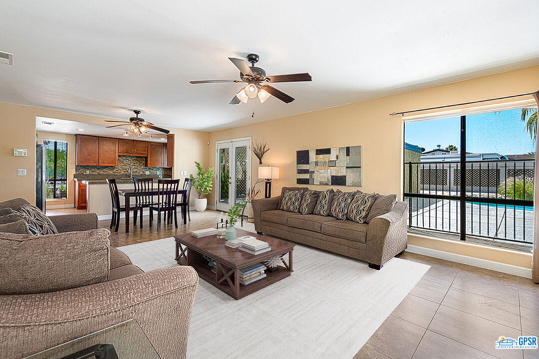 2783 North Cerritos Road Palm Springs, CA 92262 - Photo 12 of 25 a living room with furniture and a ceiling fan